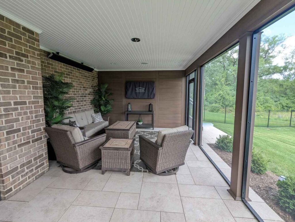 Seating area in an enclosed room beneath a deck