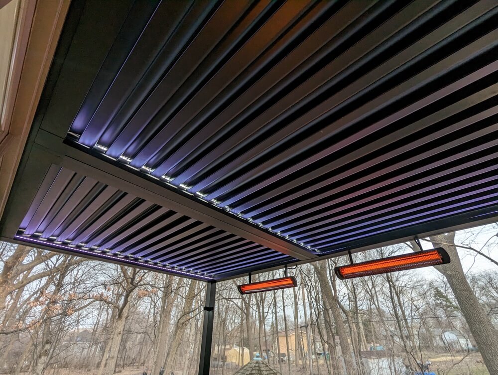 Looking up at open louvers and infrared heaters