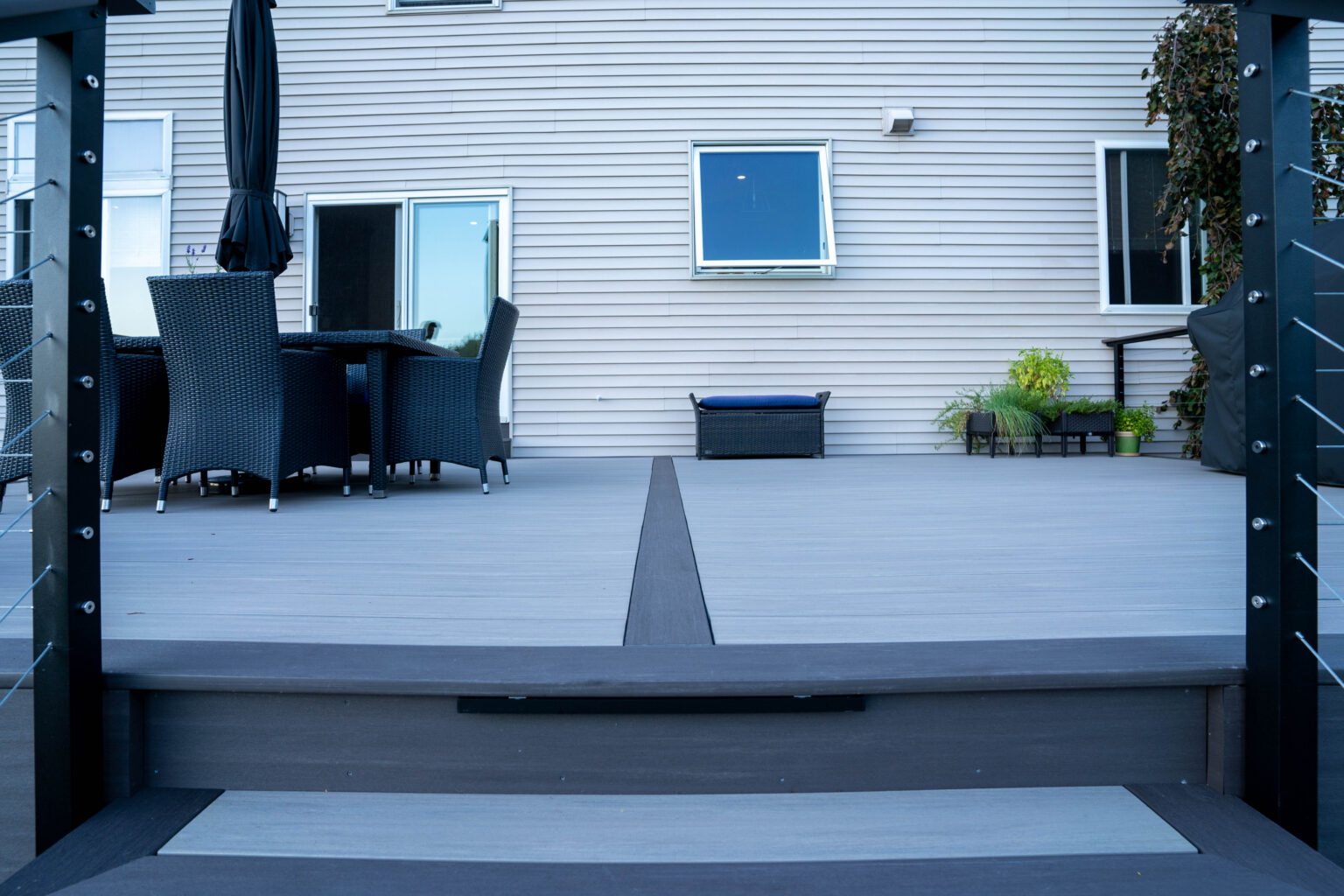 Gray composite deck with a picture-frame border