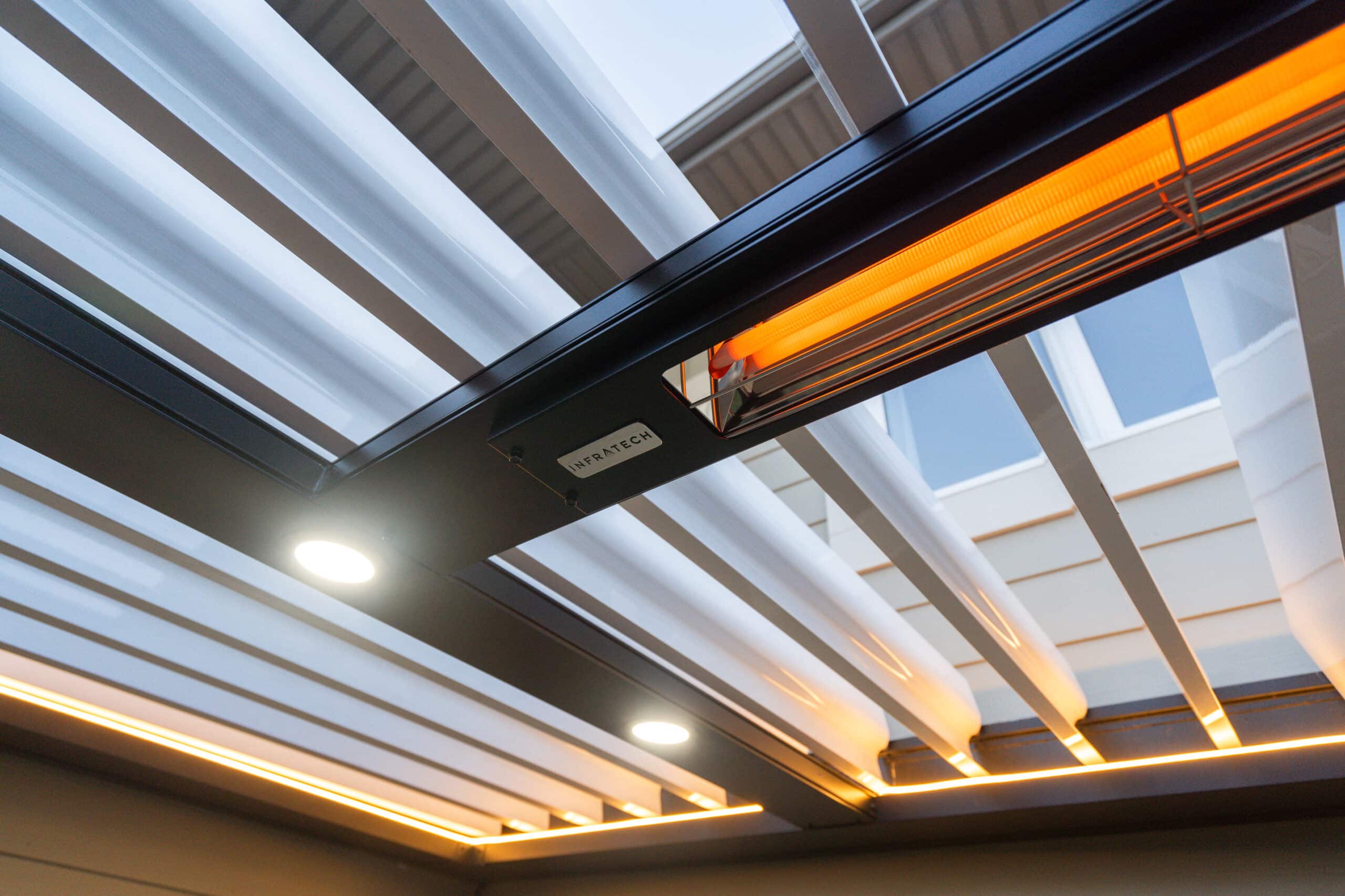 Radiant heaters in louvered pergola by Ace of Decks Chicago suburbs