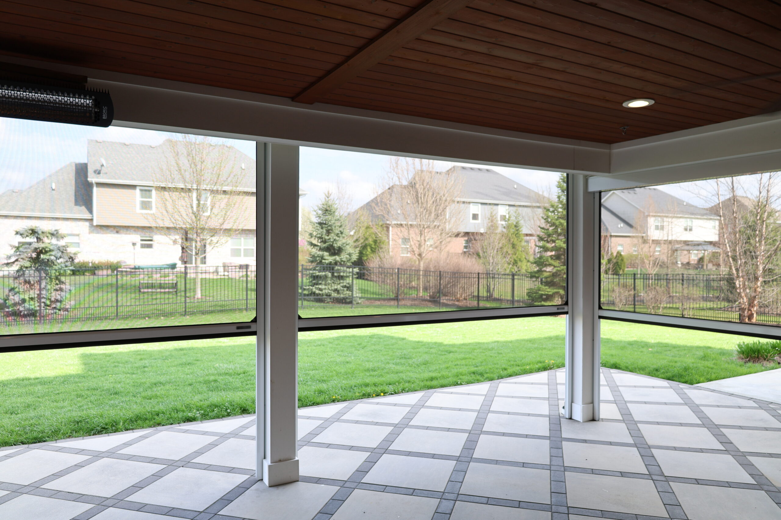 Retractable screens creating a finished outdoor living space