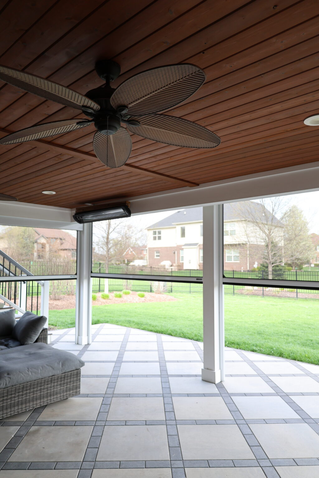 Ceiling fan and screens in the space under a deck