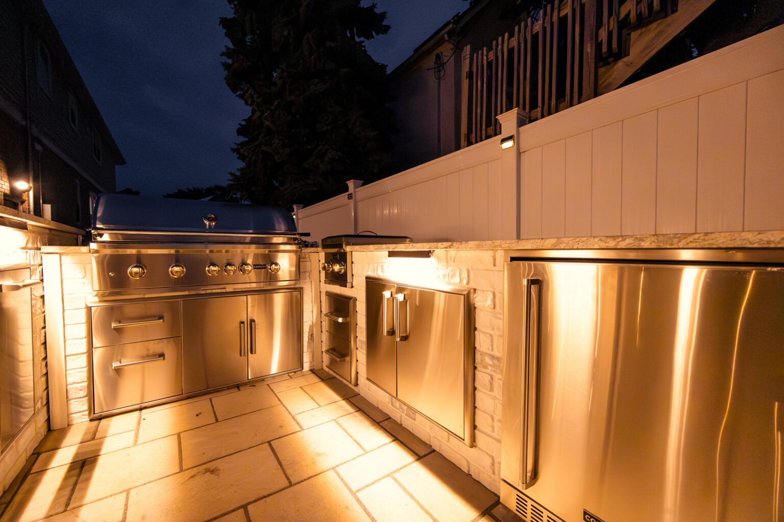 Stainless outdoor kitchen with under-counter lighting